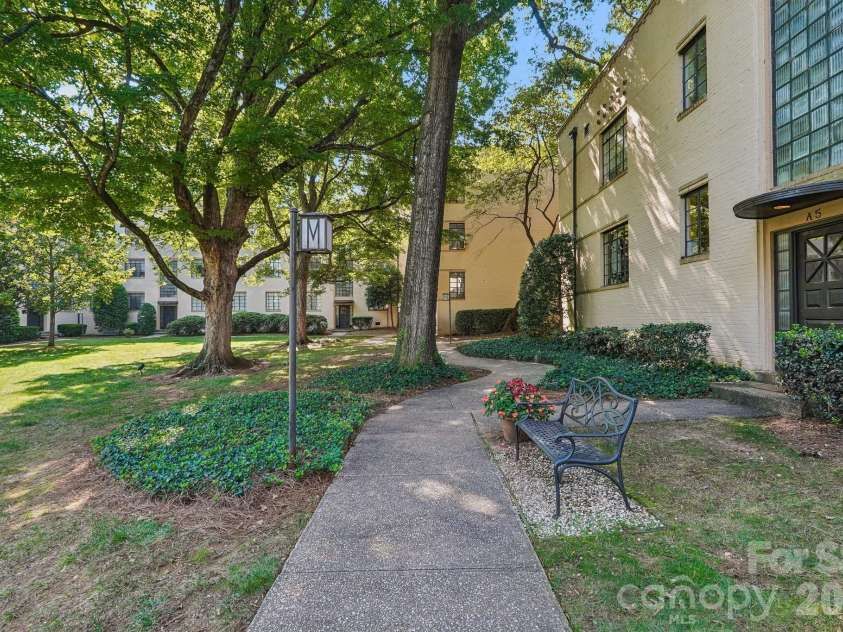 1121 Myrtle Avenue, Charlotte, NC 28203.  MLS# CAR4421930, YatesRealty ID 19454. Community park benches
