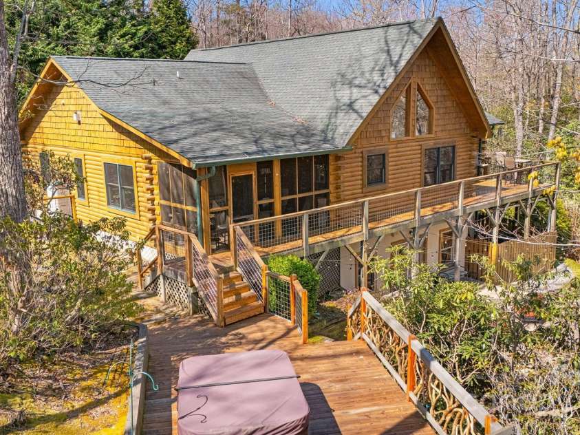 650 Faircrest Lane, Penrose, NC 28766.  MLS# CAR4242109, YatesRealty ID 19454. Huge deck with hot tub and swing