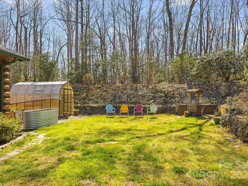 650 Faircrest Lane, Penrose, NC 28766.  MLS# CAR4242109, YatesRealty ID 19454. Level and fenced front yard