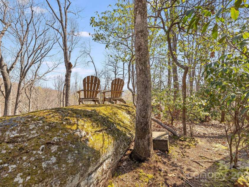 650 Faircrest Lane, Penrose, NC 28766.  MLS# CAR4242109, YatesRealty ID 19454. Natural rock outcroppings