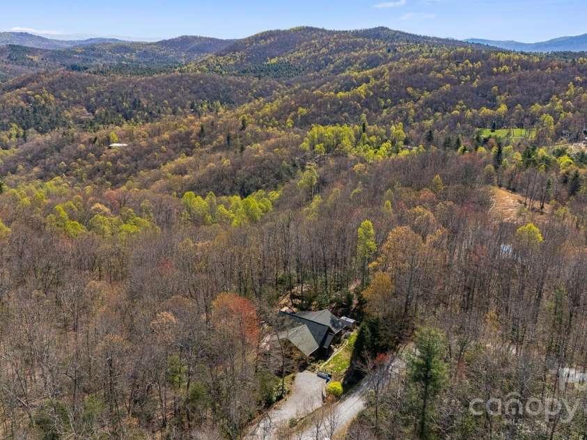 650 Faircrest Lane, Penrose, NC 28766.  MLS# CAR4242109, YatesRealty ID 19454. The Cabin pictured with mountains.