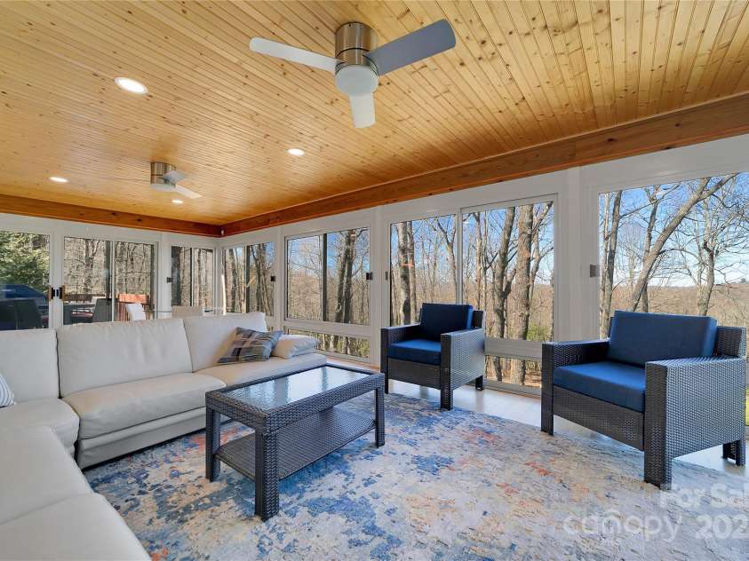 39 Udvawadulisi Court, Brevard, NC 28712.  MLS# CAR4214037, YatesRealty ID 19455. Sun Porch full of light