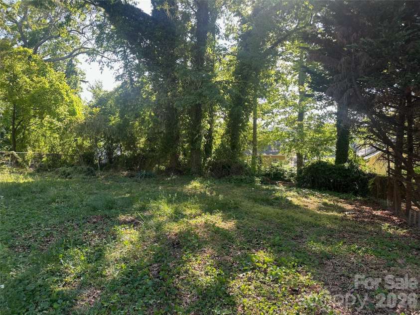 4028 Leo Street, Winston Salem, NC 27105.  MLS# CAR4379125, YatesRealty ID 19457. Back yard