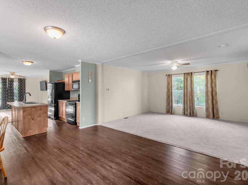 728 Preston Brooks Drive, Catawba, SC 29704.  MLS# CAR4379134, YatesRealty ID 19458. Kitchen & Living Room