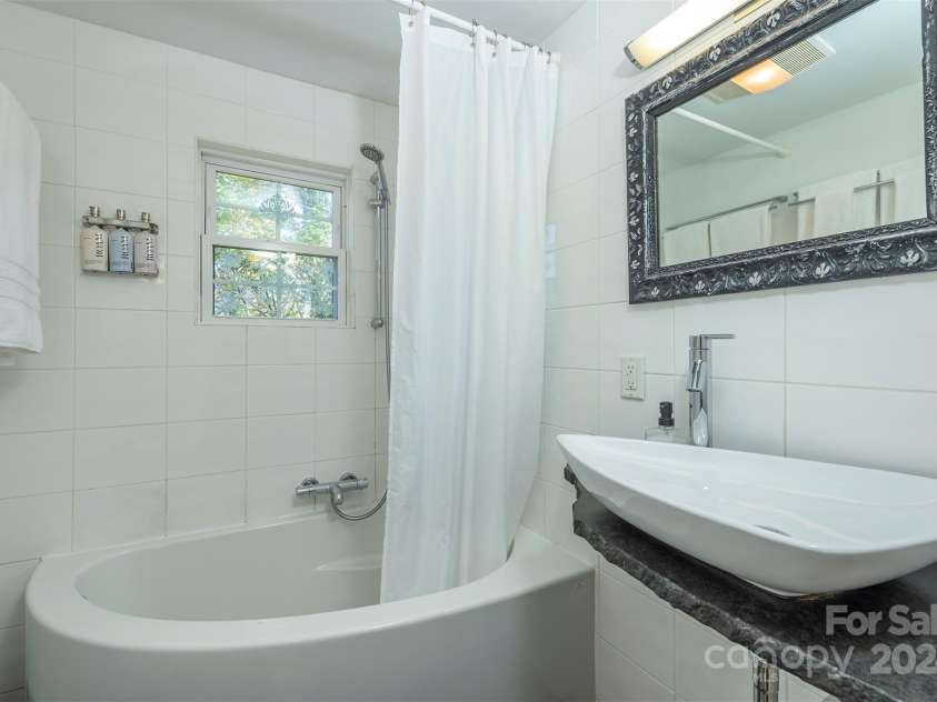 77 Kenilworth Road, Asheville, NC 28803.  MLS# CAR4199738, YatesRealty ID 1946. Guest House Bathroom