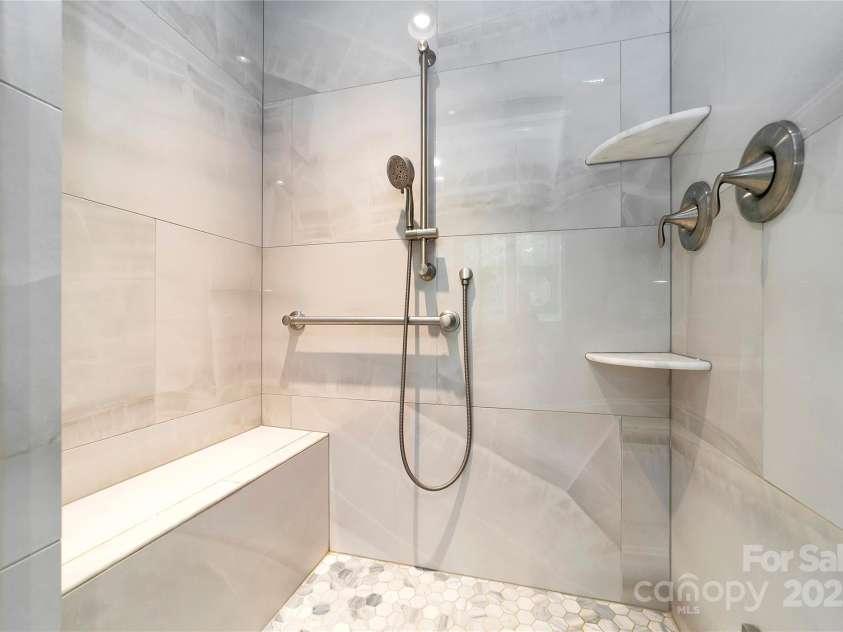 61 Tsataga Court, Brevard, NC 28712.  MLS# CAR4250347, YatesRealty ID 19462. Primary Bathroom steam shower.
