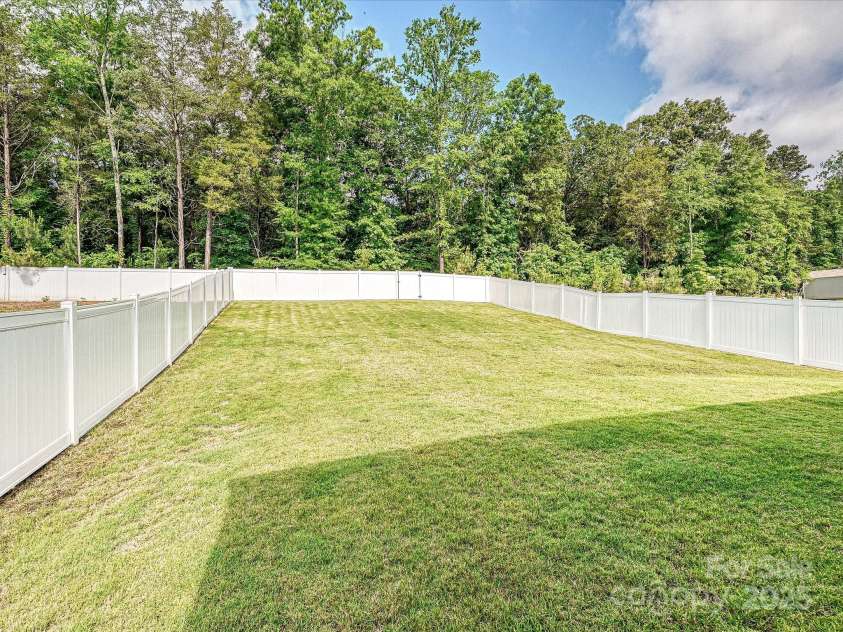 665 Pointe Andrews Drive, Concord, NC 28025.  MLS# CAR4256735, YatesRealty ID 19464. Beautiful Sodded Back Yard!!!