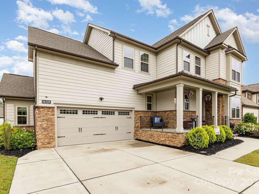 14228 Twin Eagles Lane, Charlotte, NC 28278.  MLS# CAR4260102, YatesRealty ID 19467. Extra driveway space