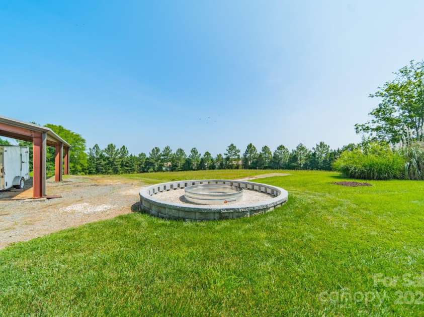 8698 Rocky River Road, Harrisburg, NC 28075.  MLS# CAR4263046, YatesRealty ID 19472. Acerage