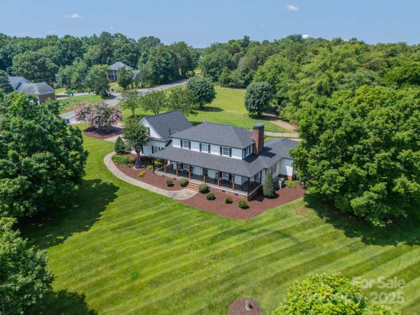 8698 Rocky River Road, Harrisburg, NC 28075.  MLS# CAR4263046, YatesRealty ID 19472. Front exterior