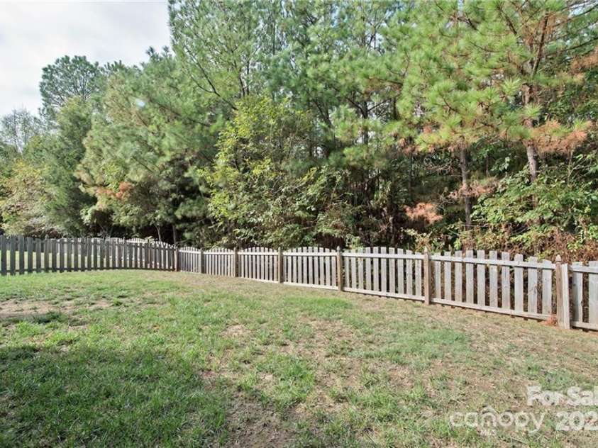 10726 Greenhead View Road, Charlotte, NC 28262.  MLS# CAR4266554, YatesRealty ID 19475. Level & Private Fenced Backyard