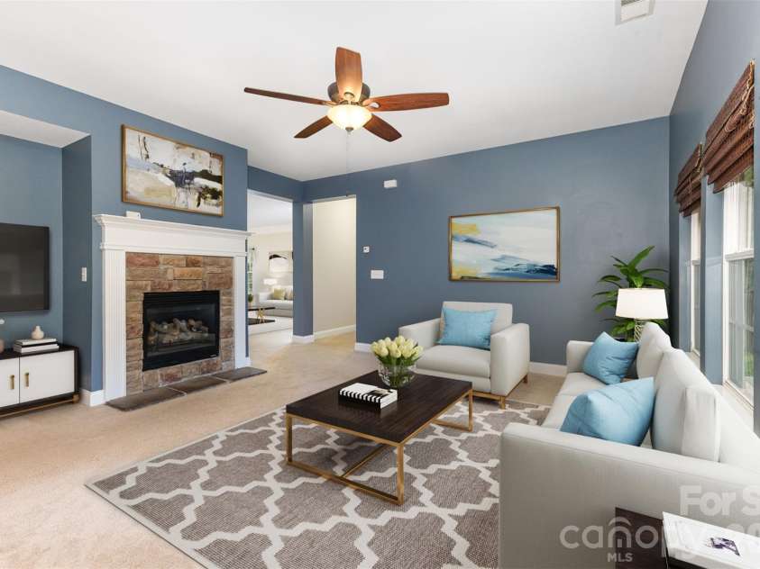 237 Lylic Woods Drive, Fort Mill, SC 29715.  MLS# CAR4268225, YatesRealty ID 1948. Virtually staged living room, view from open kitchen. 