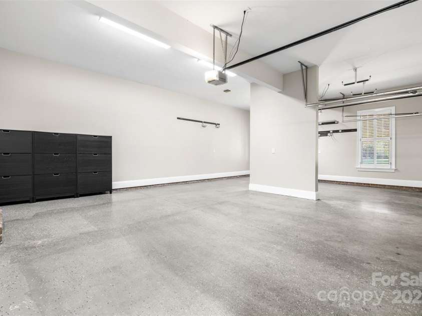 9219 Whispering Wind Drive, Charlotte, NC 28277.  MLS# CAR4261114, YatesRealty ID 19480. 3 car garage with epoxy flooring already done!