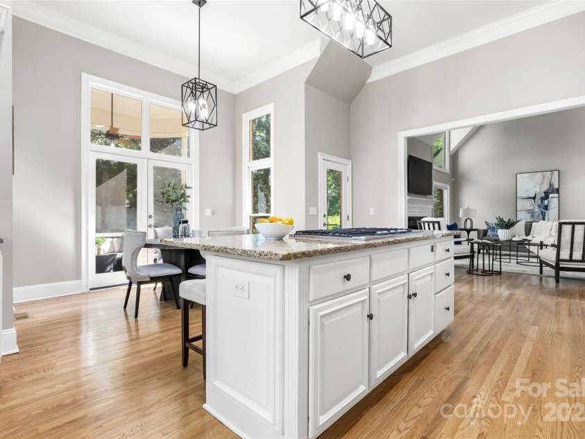 9219 Whispering Wind Drive, Charlotte, NC 28277.  MLS# CAR4261114, YatesRealty ID 19480. Double doors lead outside to screened porch!