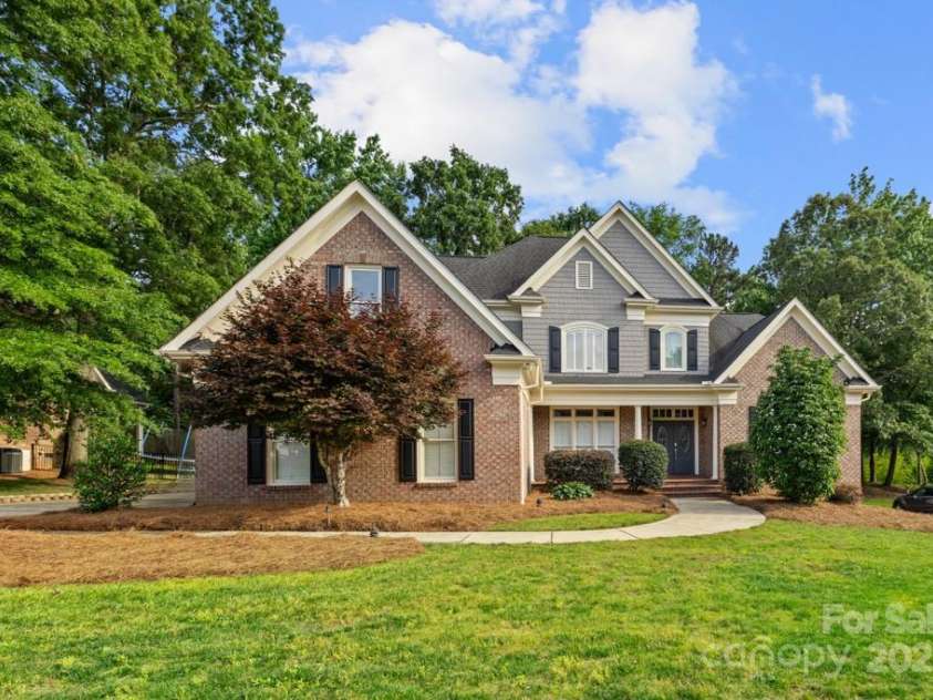 9219 Whispering Wind Drive, Charlotte, NC 28277.  MLS# CAR4261114, YatesRealty ID 19480. Full brick exterior with cedar shake accents!