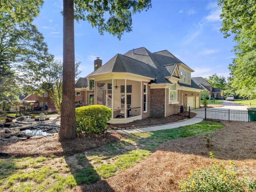 9219 Whispering Wind Drive, Charlotte, NC 28277.  MLS# CAR4261114, YatesRealty ID 19480. Look at that tree height in the yard you feel in the middle of nature!