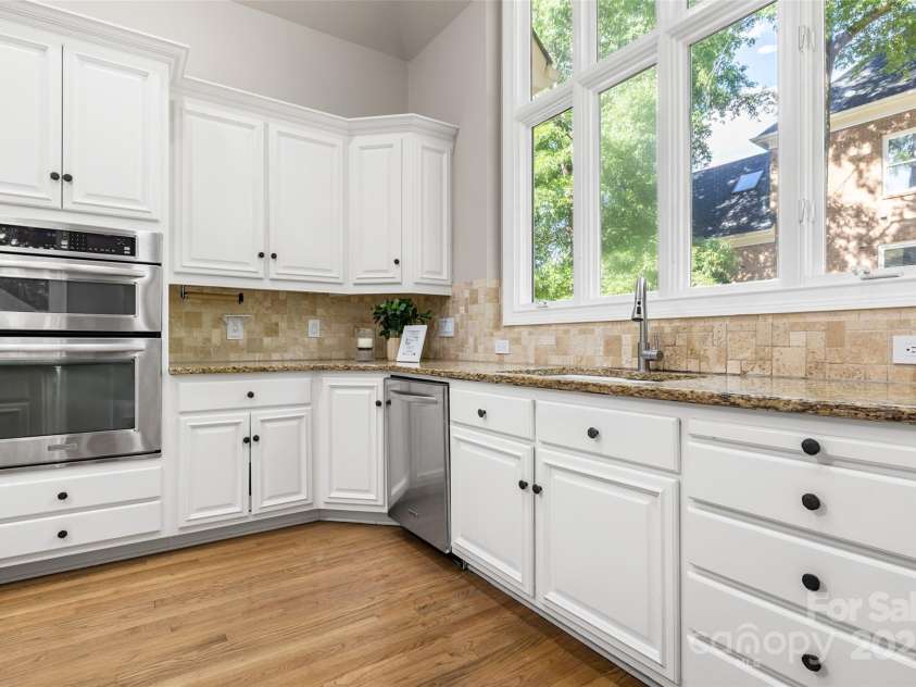 9219 Whispering Wind Drive, Charlotte, NC 28277.  MLS# CAR4261114, YatesRealty ID 19480. Look at those large windows that light up the kitchen as well!