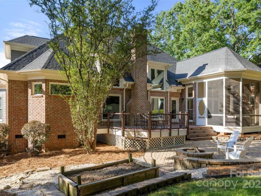 9219 Whispering Wind Drive, Charlotte, NC 28277.  MLS# CAR4261114, YatesRealty ID 19480. Trees and bushes surround the back!