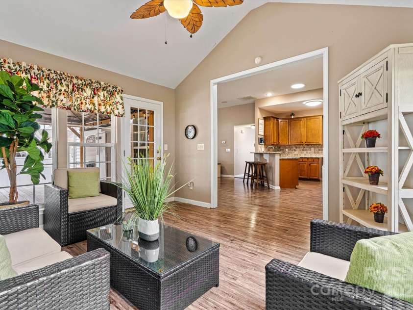 6859 Lakecrest Court, Denver, NC 28037.  MLS# CAR4290667, YatesRealty ID 19483. Exterior door from Sunroom leads to covered deck