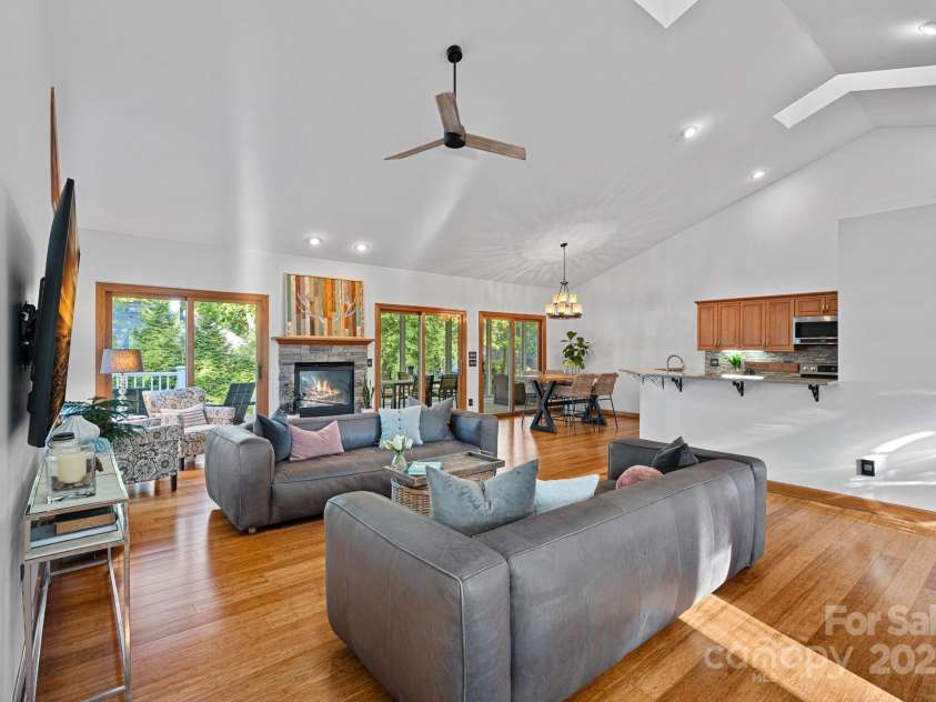300 Yacht Road, Mooresville, NC 28117.  MLS# CAR4244901, YatesRealty ID 19486. Wall of Doors Leading to Screened Porch