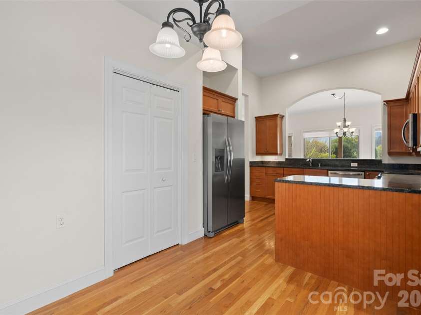 134 Augusta Circle, Waynesville, NC 28786.  MLS# CAR4367921, YatesRealty ID 19487. Breakfast area and kitchen w/ pantry