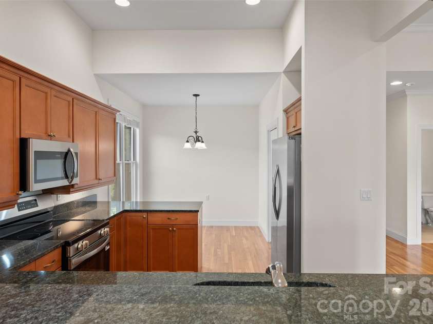 134 Augusta Circle, Waynesville, NC 28786.  MLS# CAR4367921, YatesRealty ID 19487. Kitchen and breakfast area