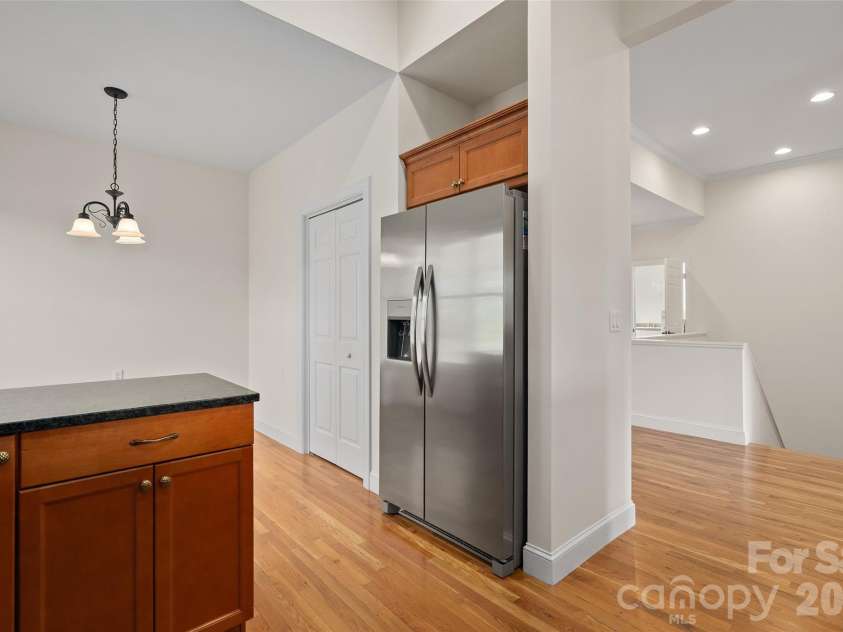 134 Augusta Circle, Waynesville, NC 28786.  MLS# CAR4367921, YatesRealty ID 19487. Kitchen and stairs in background