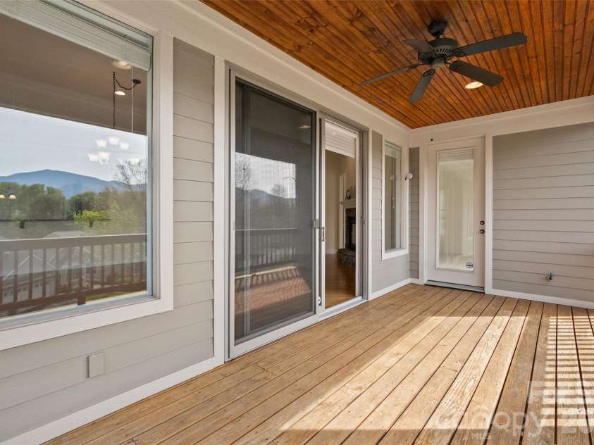 134 Augusta Circle, Waynesville, NC 28786.  MLS# CAR4367921, YatesRealty ID 19487. Main level deck