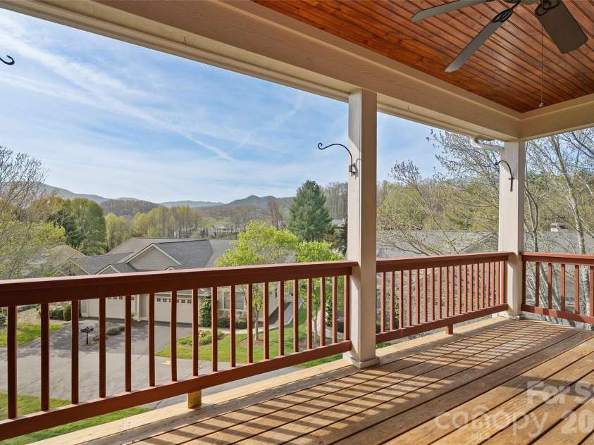 134 Augusta Circle, Waynesville, NC 28786.  MLS# CAR4367921, YatesRealty ID 19487. Main level deck with view