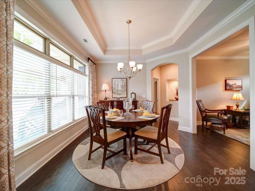 2306 Wesley Landing Road, Waxhaw, NC 28173.  MLS# CAR4248905, YatesRealty ID 19487. Dining Area overlooks the landscaped courtyard