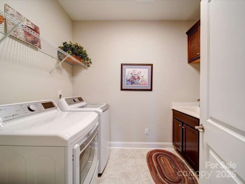 2306 Wesley Landing Road, Waxhaw, NC 28173.  MLS# CAR4248905, YatesRealty ID 19487. Laundry Room with Built in Storage