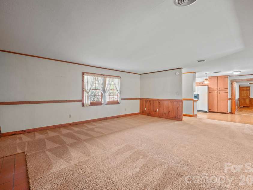 482 Miller Farm Road, Statesville, NC 28625.  MLS# CAR4319062, YatesRealty ID 1949. Den & front entry hall