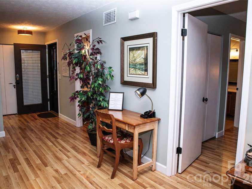 78 Upper Tanglewood Road, Lake Toxaway, NC 28747.  MLS# CAR4375733, YatesRealty ID 19491. Beautiful Flooring Throughout