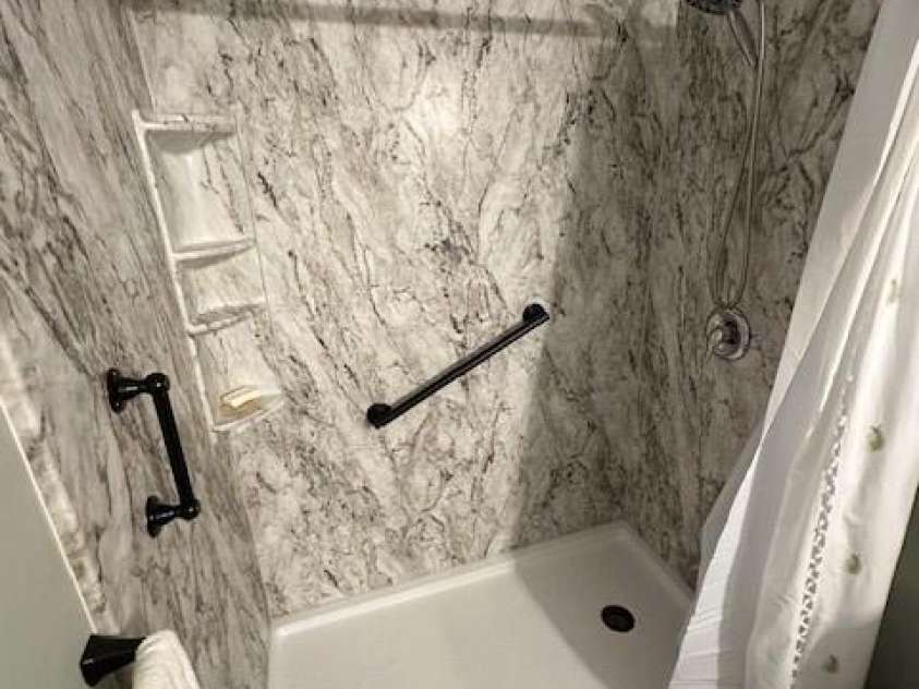 78 Upper Tanglewood Road, Lake Toxaway, NC 28747.  MLS# CAR4375733, YatesRealty ID 19491. Updated Primary Shower