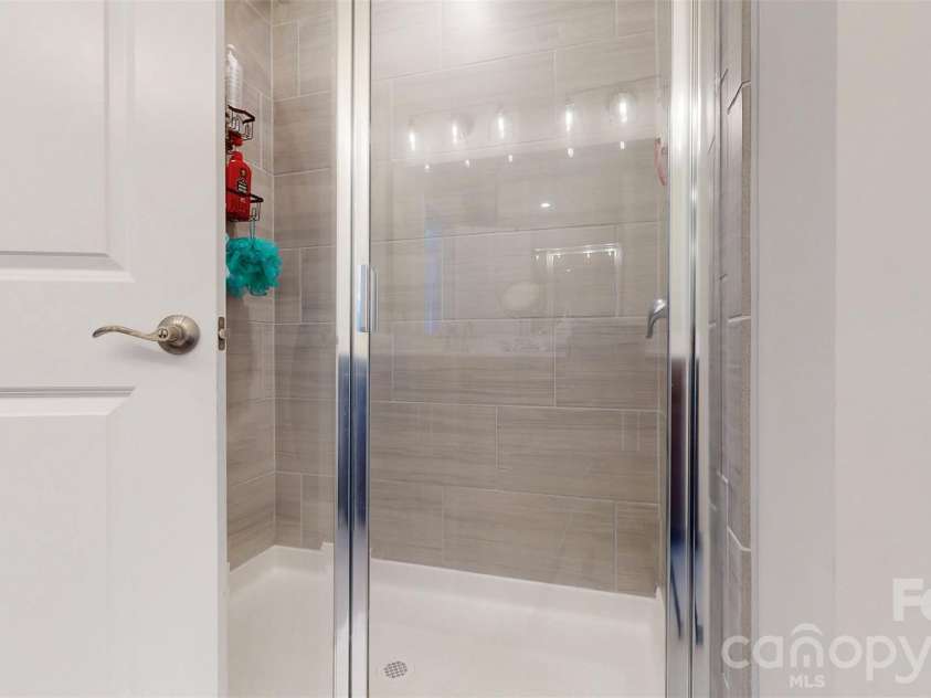 827 Canoe Song Road, Fort Mill, SC 29708.  MLS# CAR4365678, YatesRealty ID 19493. Primary bathroom