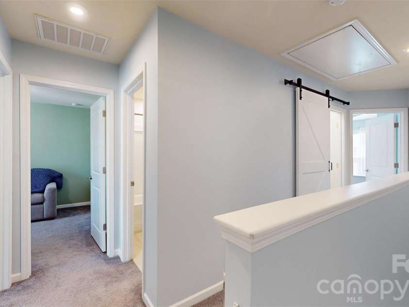 827 Canoe Song Road, Fort Mill, SC 29708.  MLS# CAR4365678, YatesRealty ID 19493. Second level hallway