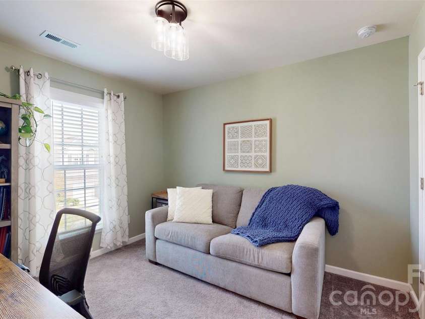 827 Canoe Song Road, Fort Mill, SC 29708.  MLS# CAR4365678, YatesRealty ID 19493. Secondary bedroom used as office.