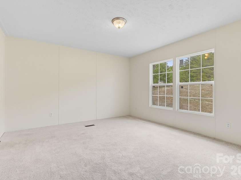111 Buck Ridge Drive, Marion, NC 28752.  MLS# CAR4375280, YatesRealty ID 19494. 