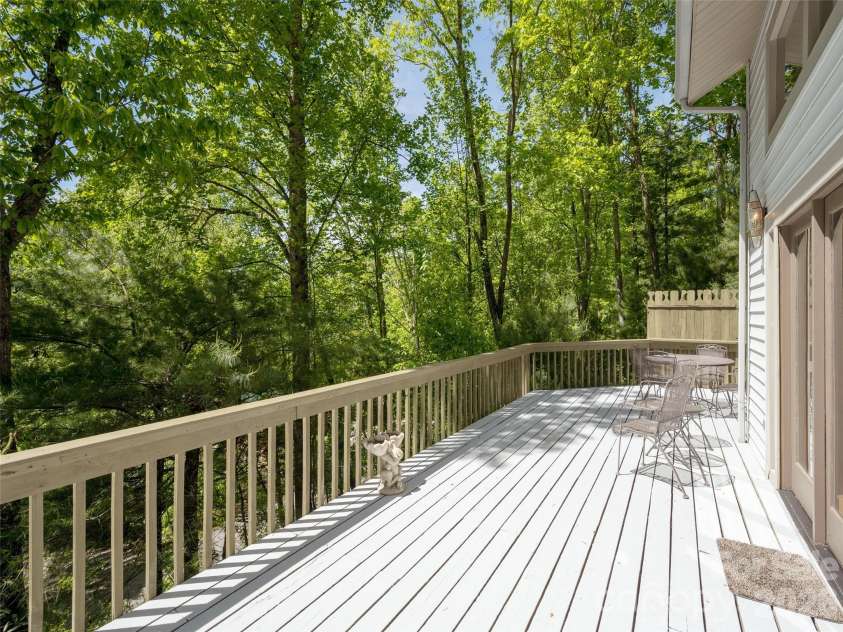 142 Sequoyah Hills Drive, Fletcher, NC 28732.  MLS# CAR4372471, YatesRealty ID 19496. Large wrap around deck with privacy
