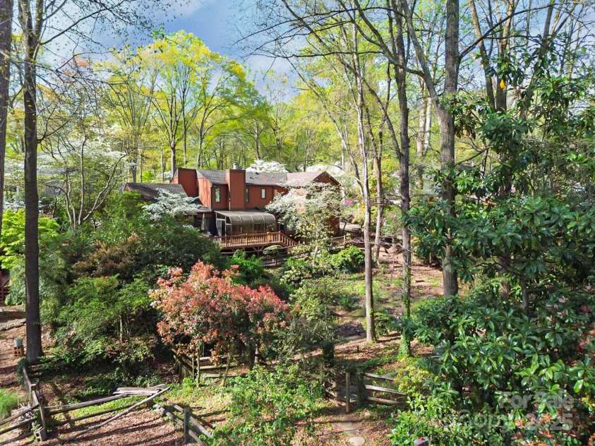 1601 Wandering Way Drive, Charlotte, NC 28226.  MLS# CAR4266480, YatesRealty ID 19498. Backyard in Spring