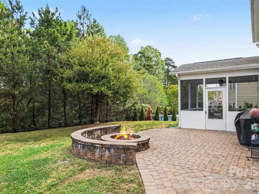 850 Coralbell Way, Fort Mill, SC 29708.  MLS# CAR4365980, YatesRealty ID 19501. Backyard Patio w/ Firepit