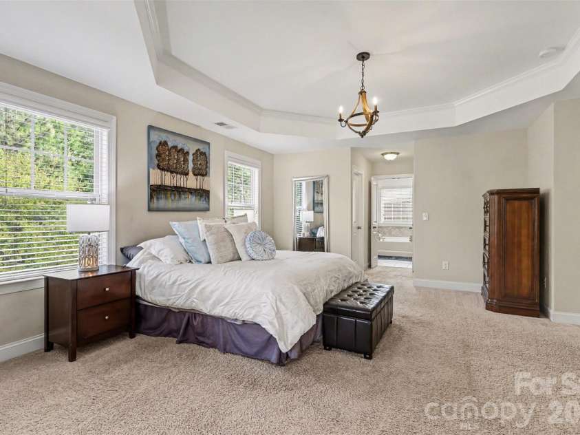 850 Coralbell Way, Fort Mill, SC 29708.  MLS# CAR4365980, YatesRealty ID 19501. Expansive primary suite with sitting area