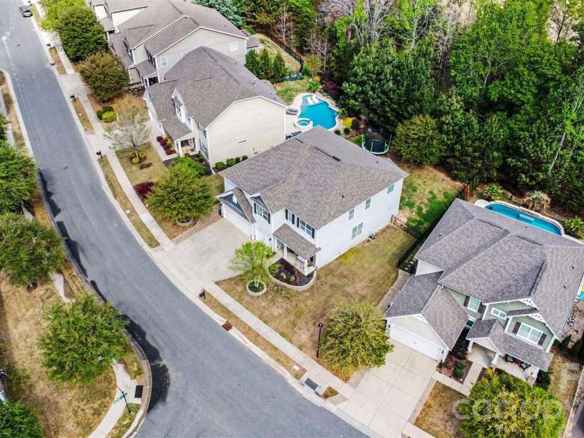 850 Coralbell Way, Fort Mill, SC 29708.  MLS# CAR4365980, YatesRealty ID 19501. Home backs up to woods for privacy but still has plenty of clear, usable space for play!