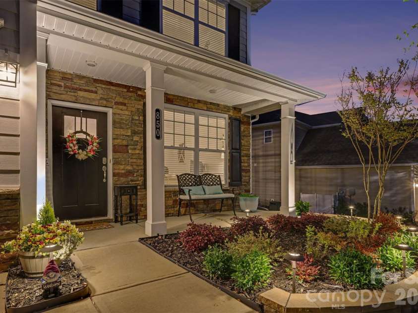 850 Coralbell Way, Fort Mill, SC 29708.  MLS# CAR4365980, YatesRealty ID 19501. Inviting front porch and landscape lighting