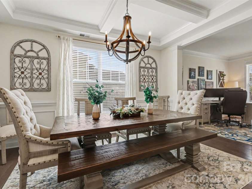 850 Coralbell Way, Fort Mill, SC 29708.  MLS# CAR4365980, YatesRealty ID 19501. Open Dining Room with beautiful coffered ceiling and molding.