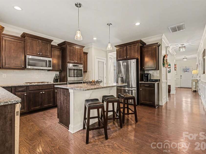 850 Coralbell Way, Fort Mill, SC 29708.  MLS# CAR4365980, YatesRealty ID 19501. Open kitchen with center island