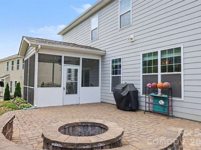 850 Coralbell Way, Fort Mill, SC 29708.  MLS# CAR4365980, YatesRealty ID 19501. Paver patio and firepit