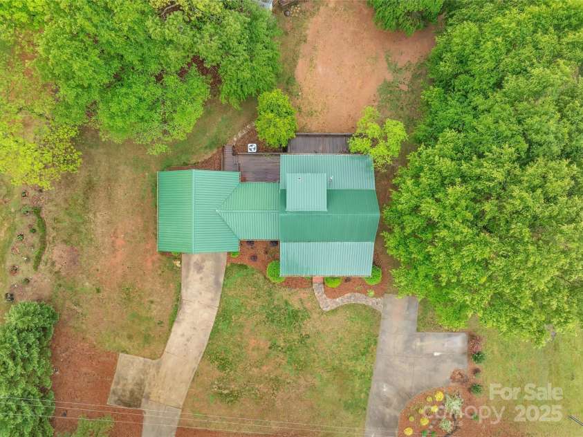 450 Lemmons Road, Mooresboro, NC 28114.  MLS# CAR4248838, YatesRealty ID 19504. 2 Driveways and pads for ample parking