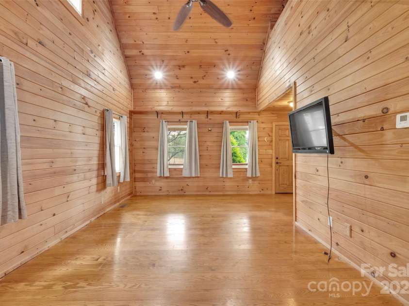 450 Lemmons Road, Mooresboro, NC 28114.  MLS# CAR4248838, YatesRealty ID 19504. View to front of home from double doors to deckgoing out to the deck