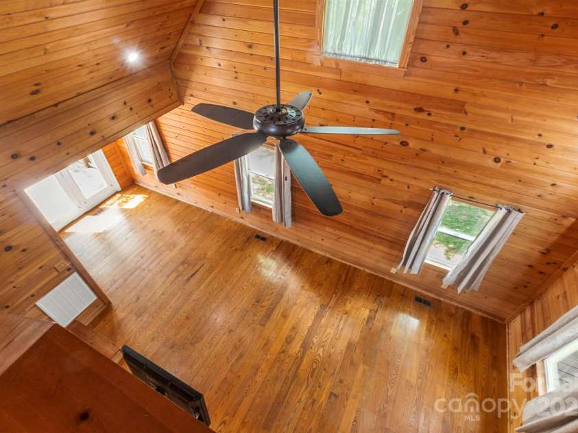 450 Lemmons Road, Mooresboro, NC 28114.  MLS# CAR4248838, YatesRealty ID 19504. View to great room from loft